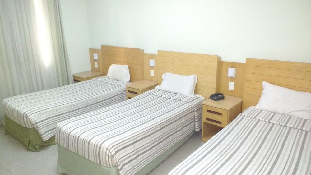 Hotel Atlantico Tower Rio de Janeiro Bagian luar foto Three beds in a hotel room