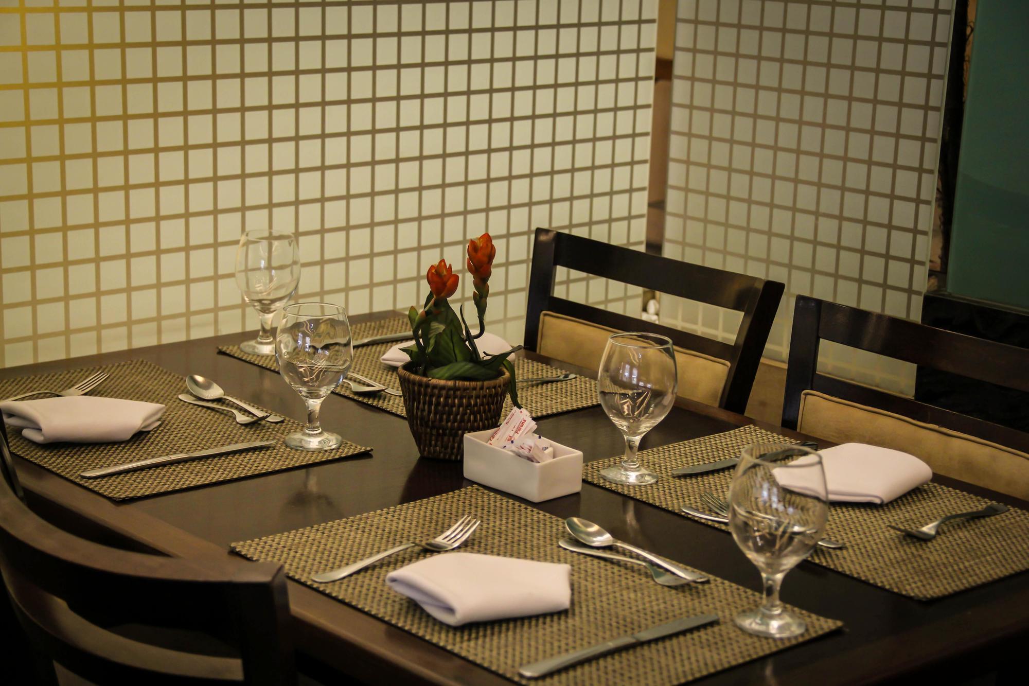 Hotel Atlantico Tower Rio de Janeiro Bagian luar foto A table set for a meal at a restaurant